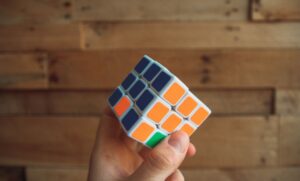 Rubix cube held